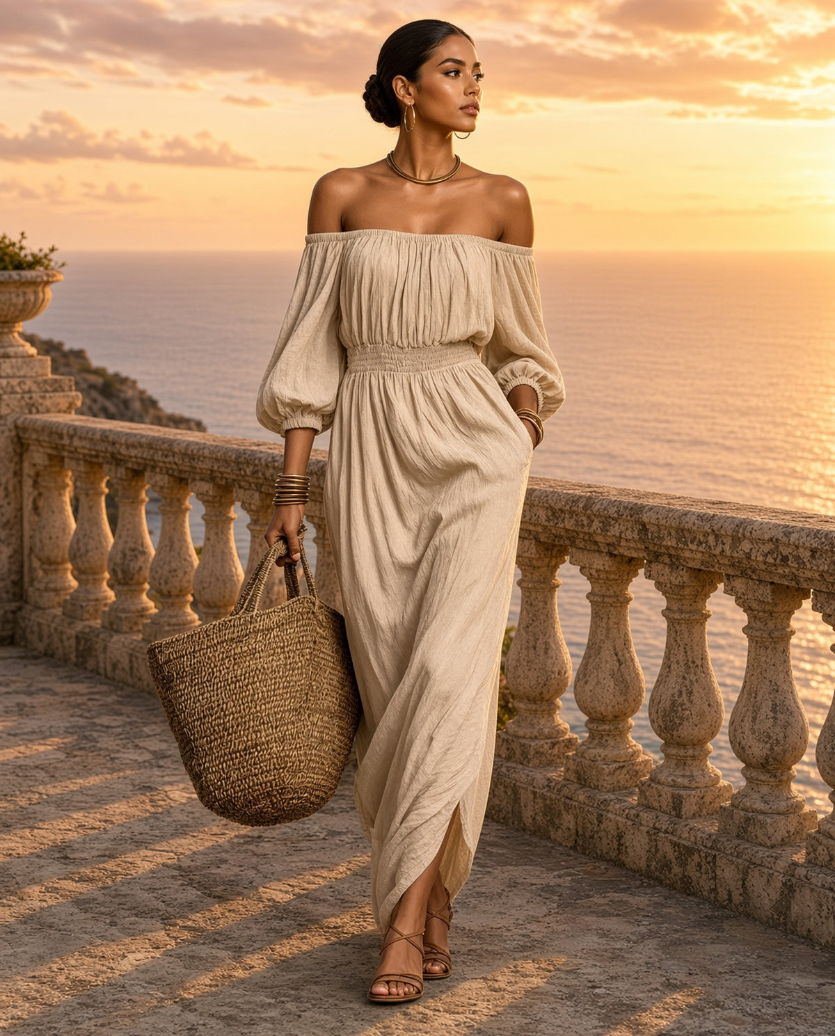 Model wearing the Kihei Off-Shoulder Smocked Maxi Dress in Khaki on a coastal terrace